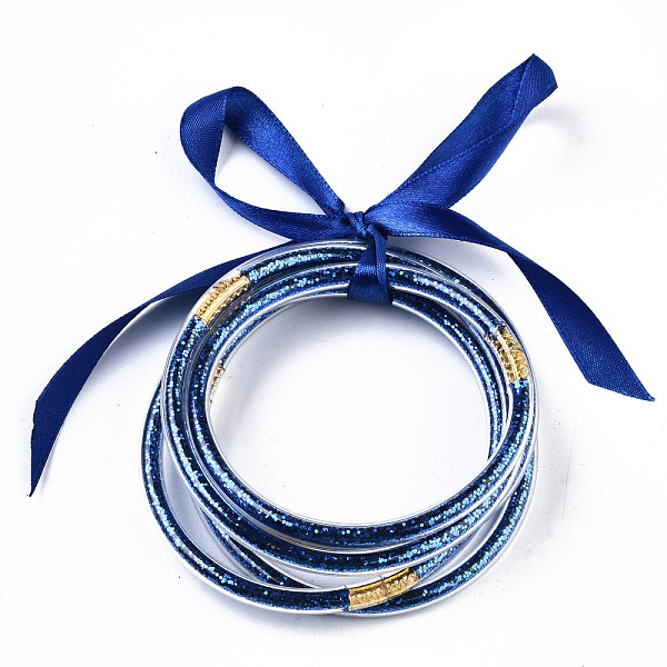

PandaHall PVC Plastic Buddhist Bangle Sets, Jelly Bangles, with Paillette and Polyester Ribbon, Blue, 2-1/2 inch(6.5cm), 5pcs/set Plastic...