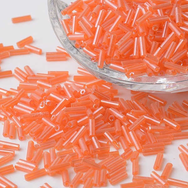 

PandaHall Transparent Colours Pearl Luster Plated Glass Bugle Beads, Round Hole, Orange Red, 6~7x1.5~2mm, Hole: 0.5mm, about 12500pcs/bag...