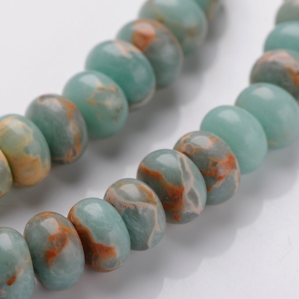 

PandaHall Synthetic Aqua Terra Jasper Beads Strands, Rondelle, 8x5mm, Hole: 1mm, about 78pcs/strand, 15.1 inch Aqua Terra Jasper Rondelle