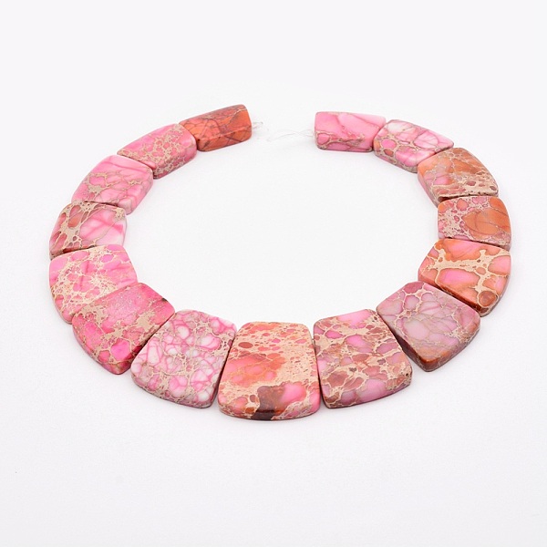 

PandaHall Natural Imperial Jasper Graduated Beads Strands, Dyed, Trapezoid, Pink, 16~34x23~28x5~6mm, Hole: 1mm, about 15pcs/strand, 12.2...