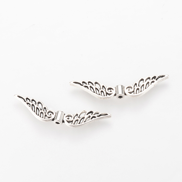 

PandaHall Tibetan Style Alloy Beads, Wing, Cadmium Free & Lead Free, Antique Silver, 7x32x3mm, Hole: 1mm Alloy Wing
