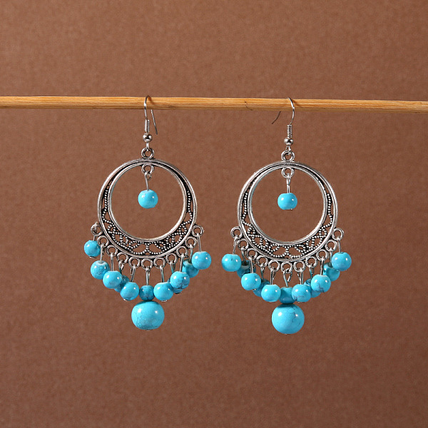 

PandaHall Bohemian tassel turquoise earrings, retro ethnic minority style earrings, personalized temperament, Tibetan ear accessories Alloy..., Green