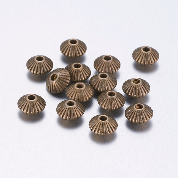 

PandaHall Tibetan Style Alloy Spacer Beads, Lead Free & Cadmium Free, Bicone, Antique Bronze, 7.5x4.6mm, Hole: 1mm Alloy Bicone