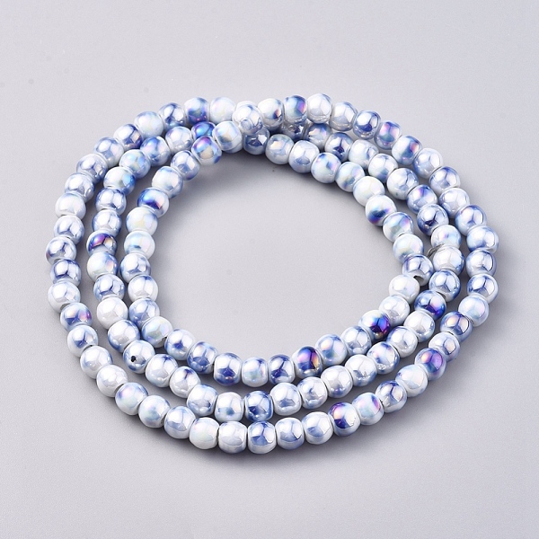 

PandaHall Handmade Porcelain Beads Strands, Fancy Antique Glazed Porcelain, Rainbow Plated, Round, White, 6~6.5x5.5mm, Hole: 1.8mm, about...