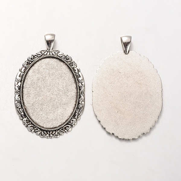

PandaHall Tibetan Style Alloy Oval Pendant Cabochon Settings, Cadmium Free & Lead Free, Antique Silver, 58x38x2mm, Hole: 5x7mm, Tray...
