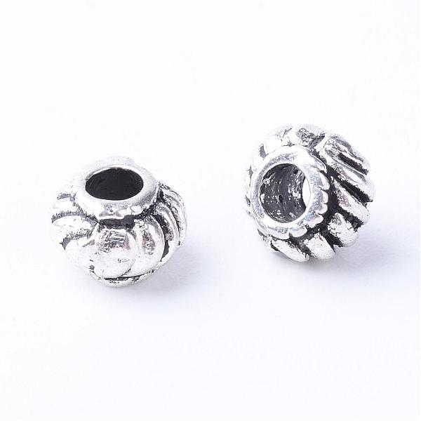 

PandaHall Tibetan Style Alloy Beads, Cadmium Free & Lead Free, Antique Silver, 6.5x4.5mm, Hole: 2.5mm, about 2170pcs/1000g Alloy Others