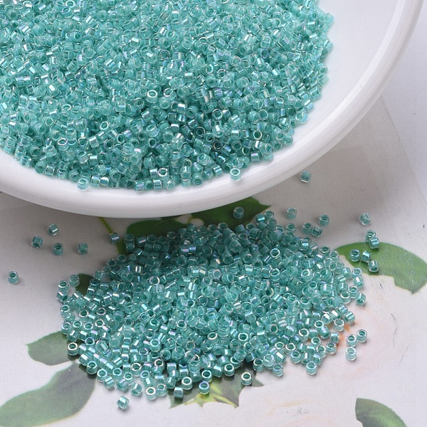 

PandaHall MIYUKI Delica Beads, Cylinder, Japanese Seed Beads, 11/0, (DB0079) Turquoise Green Lined Crystal AB, 1.3x1.6mm, Hole: 0.8mm, about..., Cyan