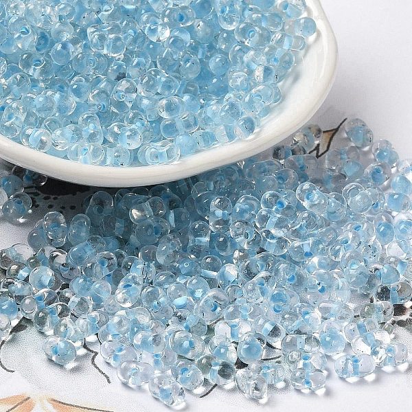 

PandaHall Glass Seed Beads, Peanut, Light Sky Blue, 5.5~6x3~3.5x3mm, Hole: 1~1.2mm, about 4000pcs/pound Glass Peanut
