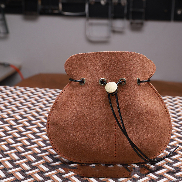 

PandaHall Cowhide Leather Jewelry Storage Pouches, Jewelry Drawstring Bags for Earring, Rings Bead Bracelet Storage, Sienna, 12.5x11cm..., Brown