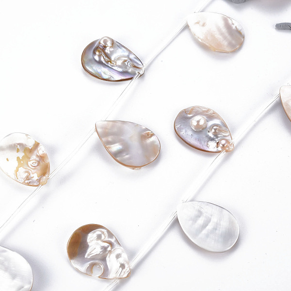 

PandaHall Shell Pearl Pendants, Top Drilled Beads, Teardrop, Seashell Color, 34~36x24~26x2~8mm, Hole: 0.7mm, about 10pcs/strand, 16.14 inch...