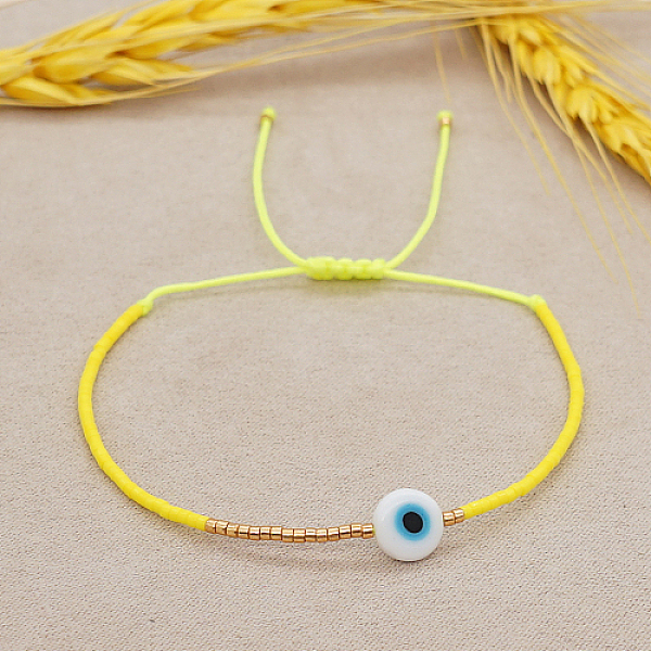 

PandaHall Adjustable Lanmpword Evil Eye Braided Bead Bracelet, Yellow, 11 inch(28cm) Lampwork Yellow