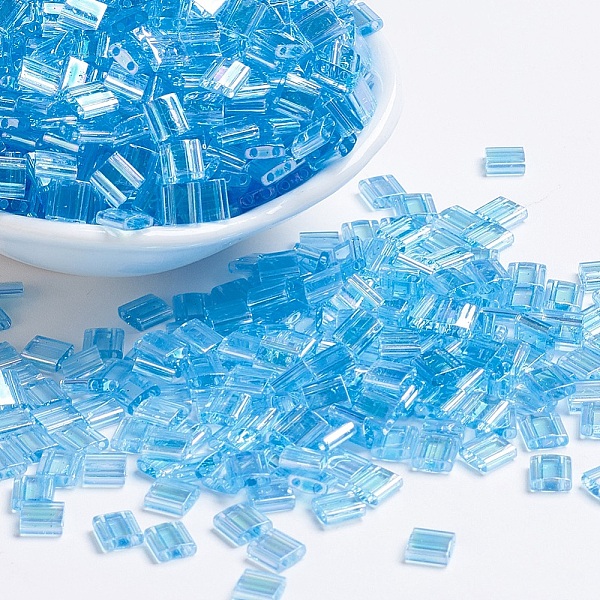 

PandaHall MIYUKI TILA Beads, Japanese Seed Beads, 2-Hole, (TL260) Transparent Aqua AB, 5x5x1.9mm, Hole: 0.8mm, about 590pcs/50g Glass Cyan