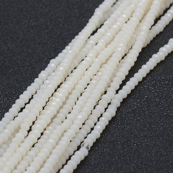

PandaHall Opaque Glass Beads Strands, Faceted, Rondelle, White, 2.5x1.5mm, Hole: 0.5mm, about 188~195pcs/strand, 12.9 inch(33cm) Glass...