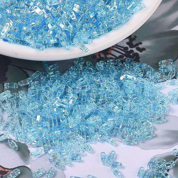 

PandaHall MIYUKI Quarter TILA Beads, Japanese Seed Beads, 2-Hole, (QTL260) Transparent Aqua AB, 5x1.2x1.9mm, Hole: 0.8mm, about 480pcs/10g..., Cyan