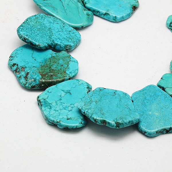 

PandaHall Nuggets Natural Magnesite Beads Strands, Dyed & Heated, 22~36x38~59x5~8mm, Hole: 1mm, 16.5 inch, about 3strands/kg Magnesite..., Cyan