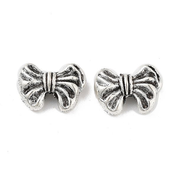 

PandaHall Tibetan Style Alloy Bead, Bowknot, Antique Silver, 9.5x13x4.5mm, Hole: 1.5mm, 384pcs/500g Alloy Bowknot