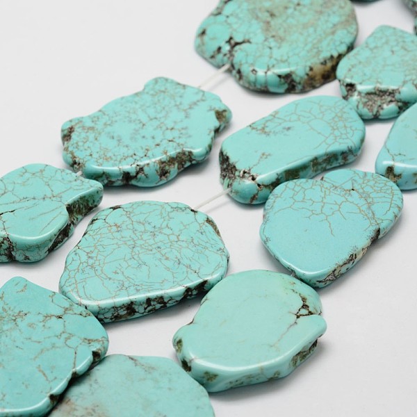 

PandaHall Natural Magnesite Beads Strands, Flat Slab Beads, Dyed, Nuggets, Dark Turquoise, 41~50.5x26.5~35.5x5~8mm, Hole: 1mm, about..., Cyan