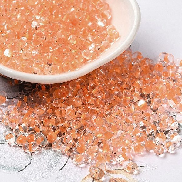 

PandaHall Glass Seed Beads, Peanut, Light Salmon, 5.5~6x3~3.5x3mm, Hole: 1~1.2mm, about 4000pcs/pound Glass Peanut