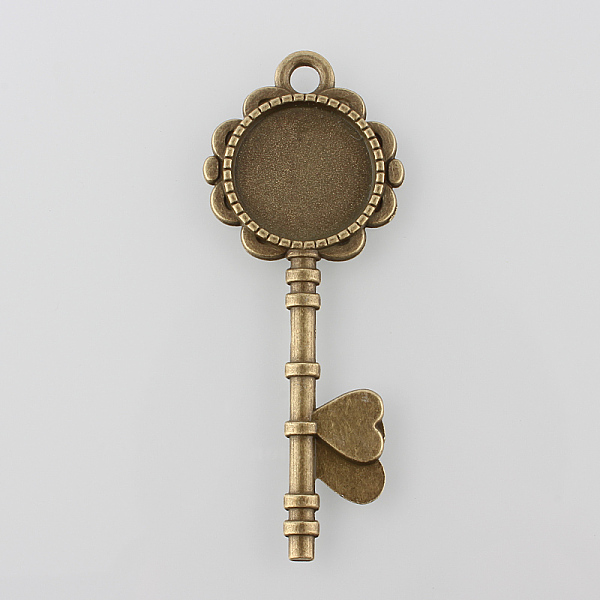 

PandaHall Tibetan Style Antique Bronze Alloy Key Pendant Cabochon Settings, Cadmium Free & Nickel Free & Lead Free, Tray: 20mm, 73x29x2mm...