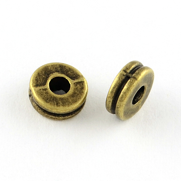 

PandaHall Tibetan Style Flat Round Alloy Spacers Beads, Cadmium Free & Lead Free, Antique Bronze, 6x3mm, Hole: 1.5mm, about 2500pcs/1000g...