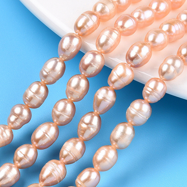 

PandaHall Natural Cultured Freshwater Pearl Beads Strands, Rice, Wheat, 7~12.5x6~6.5mm, Hole: 0.7~0.8mm, about 37~38pcs/strand, 13.78 inch..., Orange