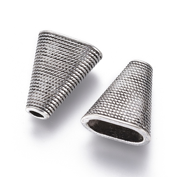 

PandaHall Tibetan Style Bead Cones, Triangle, Cadmium Free & Nickel Free, Antique Silver, 23x19x9mm, Hole: 4x2mm, Inner Size: 15x7mm Alloy