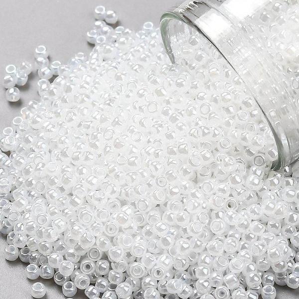 

PandaHall TOHO Round Seed Beads, Japanese Seed Beads, (141) Translucent Ceylon Snowflake, 11/0, 2.2mm, Hole: 0.8mm, about 1103pcs/10g Glass..., White