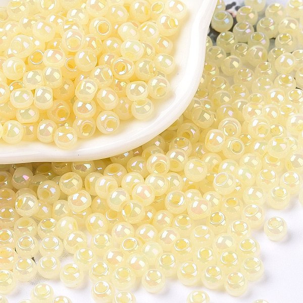 

PandaHall 6/0 Opaque Colours Rainbow Plated Round Glass Seed Beads, Champagne Yellow, 4x3mm, Hole: 1.2mm, about 7200pcs/pound Glass