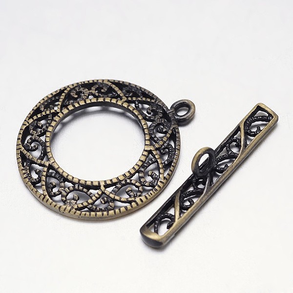

PandaHall Filigree Brushed Brass Ring Toggle Clasps, Nickel Free, Antique Bronze, Ring: 26x22x2mm, Bar: 6x26x4mm, Hole: 1mm Brass Ring