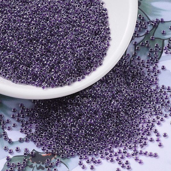 

PandaHall MIYUKI Round Rocailles Beads, Japanese Seed Beads, (RR223) Grape Lined Crystal, 11/0, 2x1.3mm, Hole: 0.8mm, about 1100pcs/bottle..., Purple