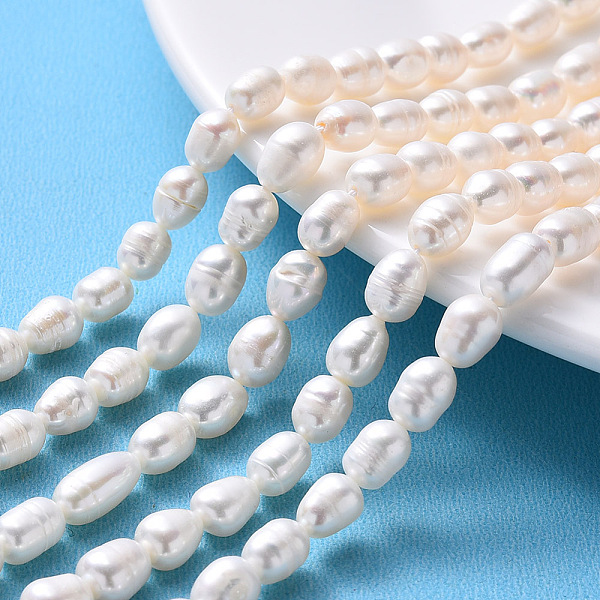

PandaHall Natural Cultured Freshwater Pearl Beads Strands, Rice, Seashell Color, 6.5~7.5x6.5~15, hole: 0.8mm, about 19~22pcs/strand, 6.89...