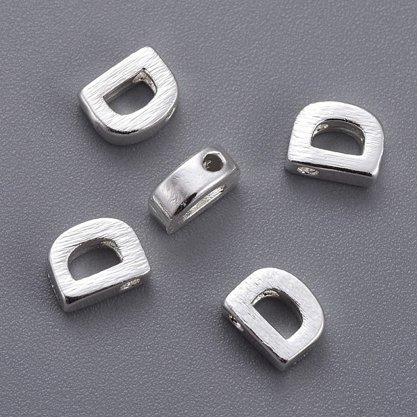 

PandaHall Brass Charms, Letter, Letter.D, 6x4.5x2mm, Hole: 1mm Brass Letter D
