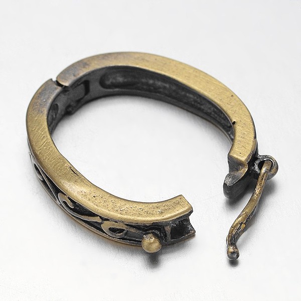 

PandaHall Carved Oval Rack Plating Brass Twister Clasps, Nickel Free, Brushed Antique Bronze, 27x19x5mm, Hole: 19x13mm Brass
