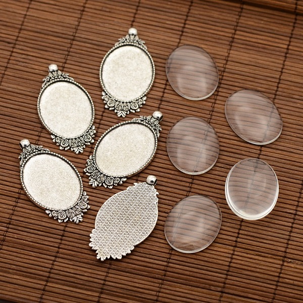 

PandaHall Tibetan Style Alloy Pendant Cabochon Settings, Oval with Flower and Transparent Oval Glass Cabochons, Antique Silver, Tray...