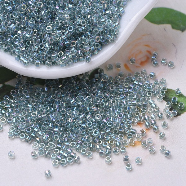 

PandaHall MIYUKI Delica Beads, Cylinder, Japanese Seed Beads, 11/0, (DB0084) Sea Foam Lined Crystal AB, 1.3x1.6mm, Hole: 0.8mm, about..., Cyan
