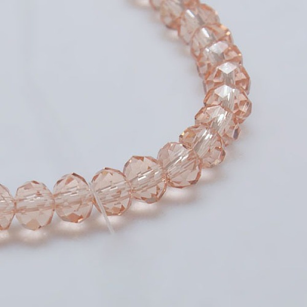 

PandaHall Transparent Glass Bead Strands, Faceted, Rondelle, Light Salmon, 6x4mm, Hole: 1mm, about 87~90pcs/strand, 18.5 inch Glass Rondelle