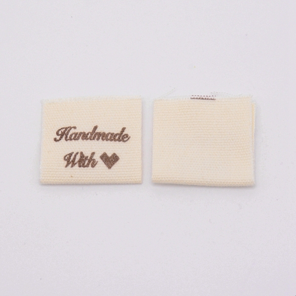 

PandaHall Woven Sewing Labels, Cloth Labels, for Sewing, Knitting, Crafts, Word Handmade with Heart, Khaki, 39x21x0.3mm Cloth Yellow