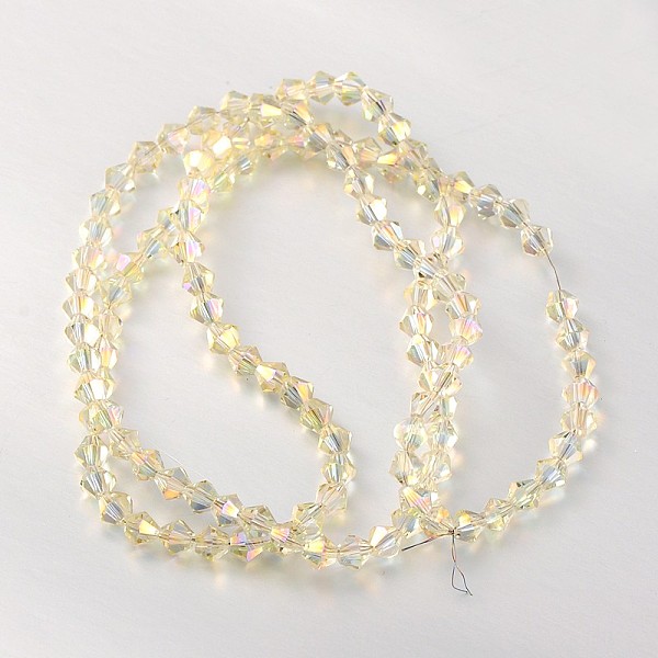 

PandaHall Faceted Bicone Glass Beads Strands, Light Yellow, 4x4mm, Hole: 1mm, about 82~85pcs/strand, 30.5~31cm Glass Bicone Yellow