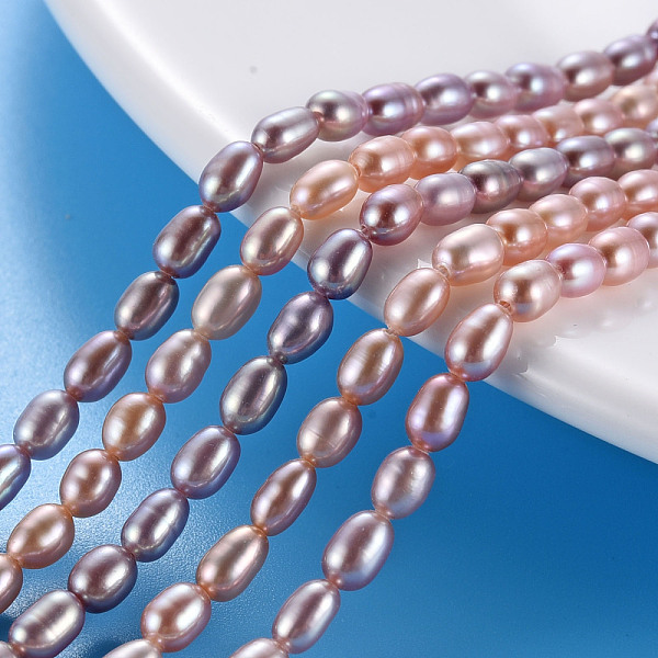 

PandaHall Natural Cultured Freshwater Pearl Beads Strands, Rice, Lilac, 4.5~6x3~3.5mm, Hole: 0.5mm, about 76~78pcs/strand, 14.37 inch..., Purple