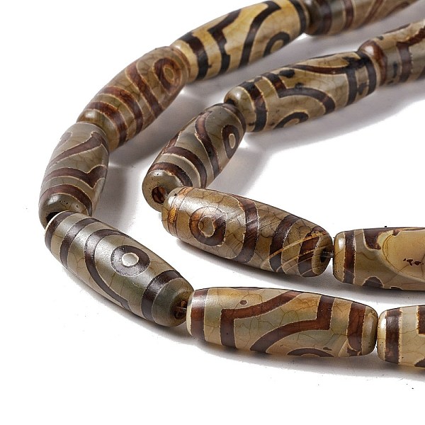 

PandaHall Tibetan Style dZi Beads Strands, Natural & Dyed Agate Beads, Rice, 2-Eye, 28.5~30x10mm, Hole: 2.5mm, about 10pcs/strand, 11.81''...