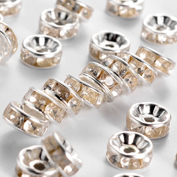 

PandaHall Iron Rhinestone Spacer Beads, Grade B, Straight Edge, Rondelle, Silver Color Plated, Clear, Size: about 7~8mm in diameter, 3.5mm...