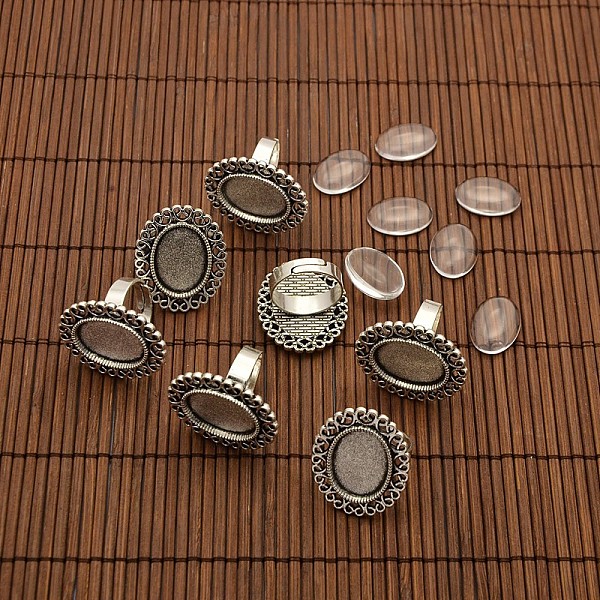 

PandaHall 13x18mm Oval Transparent Glass Cabochons and Iron Flower Finger Ring Components Alloy Cabochon Bezel Settings for DIY, Antique..., Clear