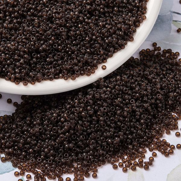 

PandaHall MIYUKI Round Rocailles Beads, Japanese Seed Beads, 15/0, (RR2400) Transparent Dark Topaz, 1.5mm, Hole: 0.7mm, about 5555pcs/10g..., Brown