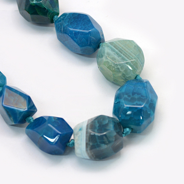 

PandaHall Faceted Nuggets Natural Dyed Agate Graduated Beads Strands, Dodger Blue, 14~35x13~28x11~13mm, Hole: 2~3mm, about 17~21pcs/strand...