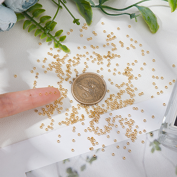 

PandaHall UNICRAFTALE About 500pcs Golden Surgical Stainless Steel Crimp Beads Metal Stopper Spacers Beads Large Hole Ring Bead for Jewelry...