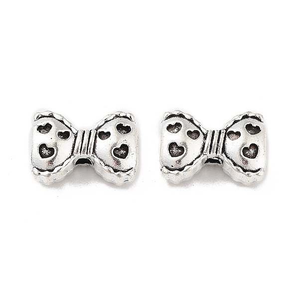 

PandaHall Tibetan Style Alloy Bead, Bowknot with Heart, Antique Silver, 8.5x12.5x5mm, Hole: 1.6mm Alloy Bowknot