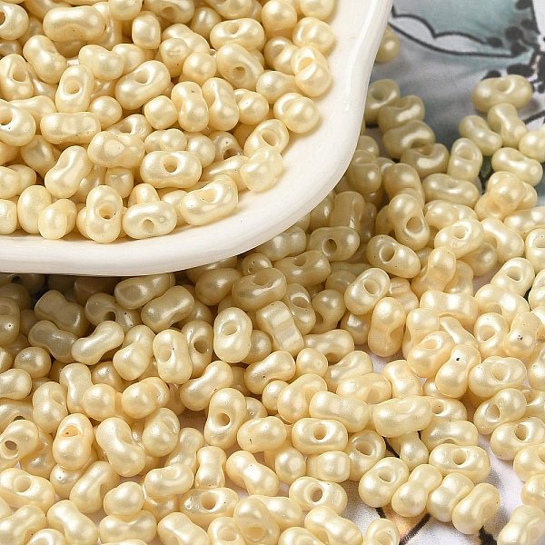 

PandaHall Baking Paint Glass Seed Beads, Peanut, Antique White, 5.5~6x3~3.5x3mm, Hole: 1~1.2mm, about 4000pcs/pound Glass Peanut