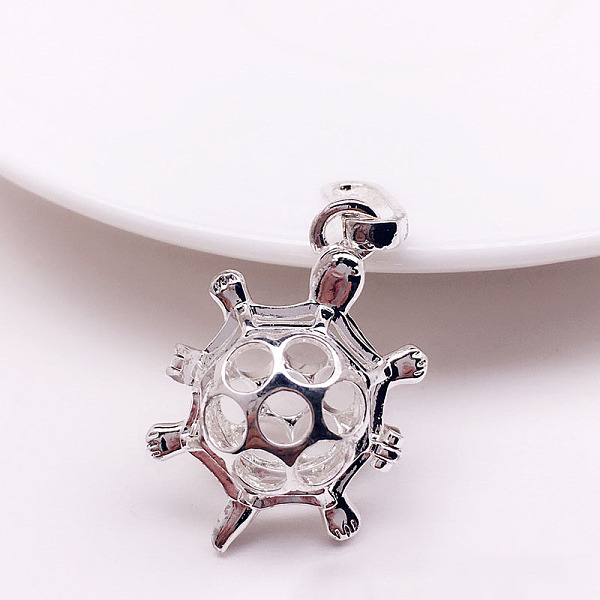 

PandaHall Brass Bead Cage Pendants, for Chime Ball Pendant Necklaces Making, Hollow Tortoise Charm, Silver, 29x20.5x15mm, Hole: 9.5x4mm...