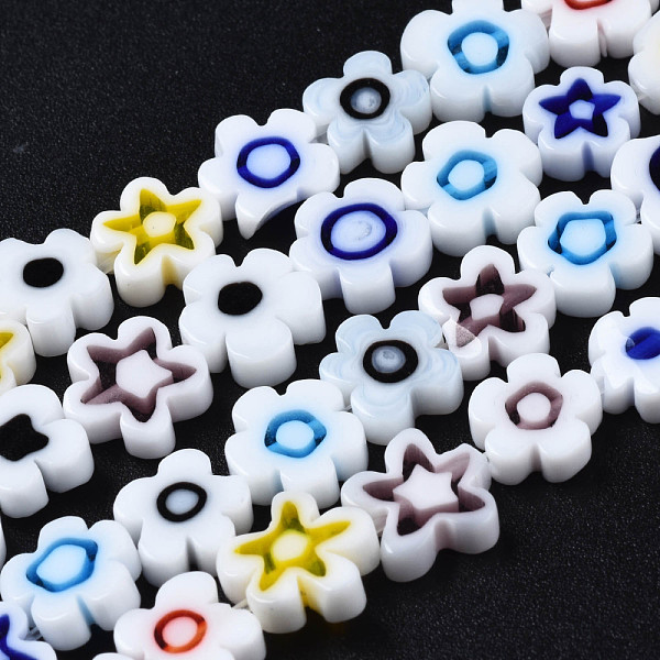 

PandaHall Handmade Millefiori Glass Bead Strands, Flower, White, 7.5~9x3mm, Hole: 1mm, about 55~57pcs/strand, 15.55 inch~15.94 inch...