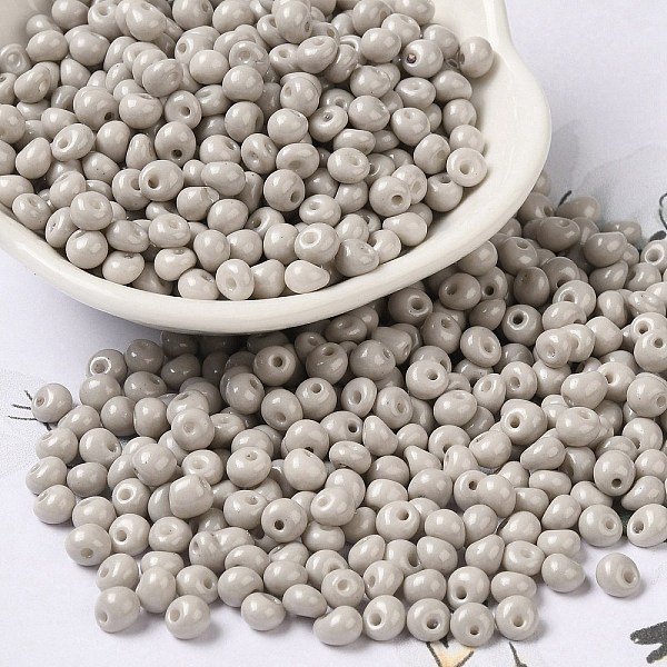 

PandaHall 6/0 Opaque Baking Paint Glass Seed Beads, Teardrop, Light Grey, 4.5~5x4x3~3.5mm, Hole: 0.9mm, about 5625Pcs/Pound Glass Teardrop